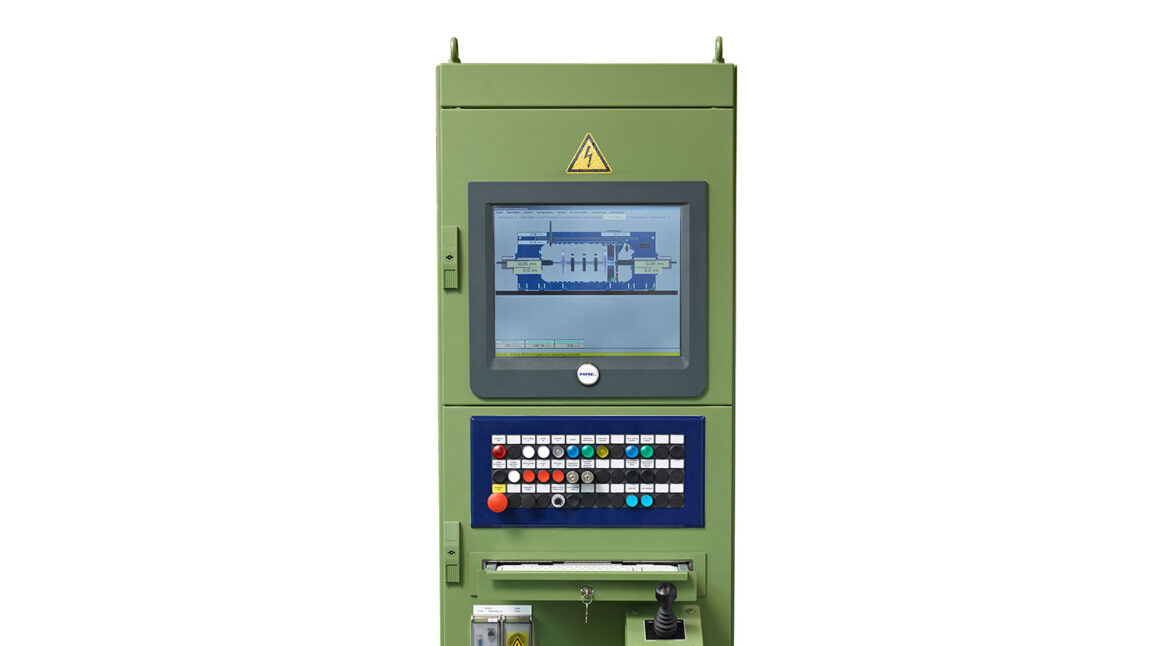 Dusky green older straightening press control station with outdated display ideal for industrial retrofitting and conversion